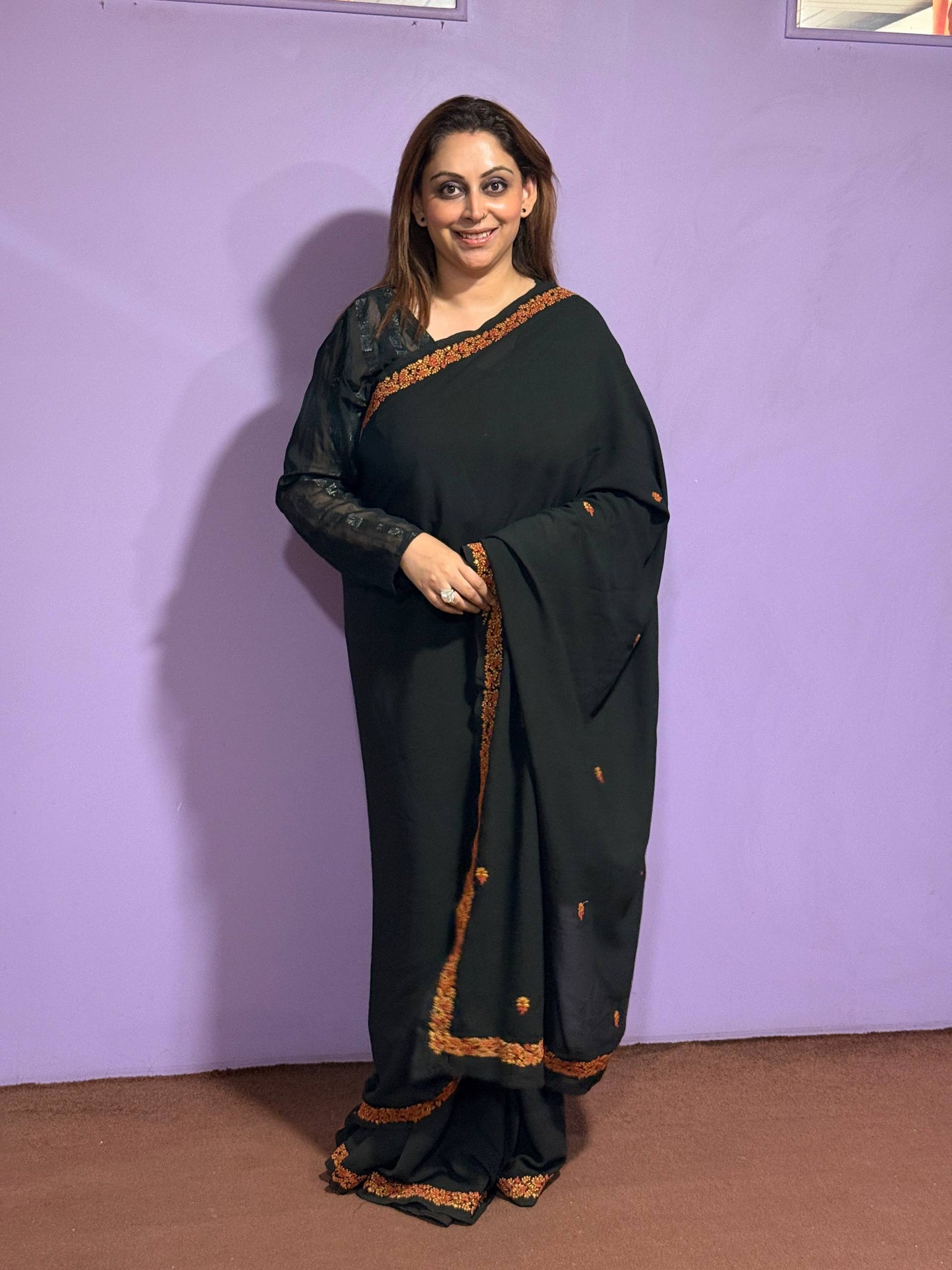 Black Georgette Saree with Hand Aari Work and Motifs