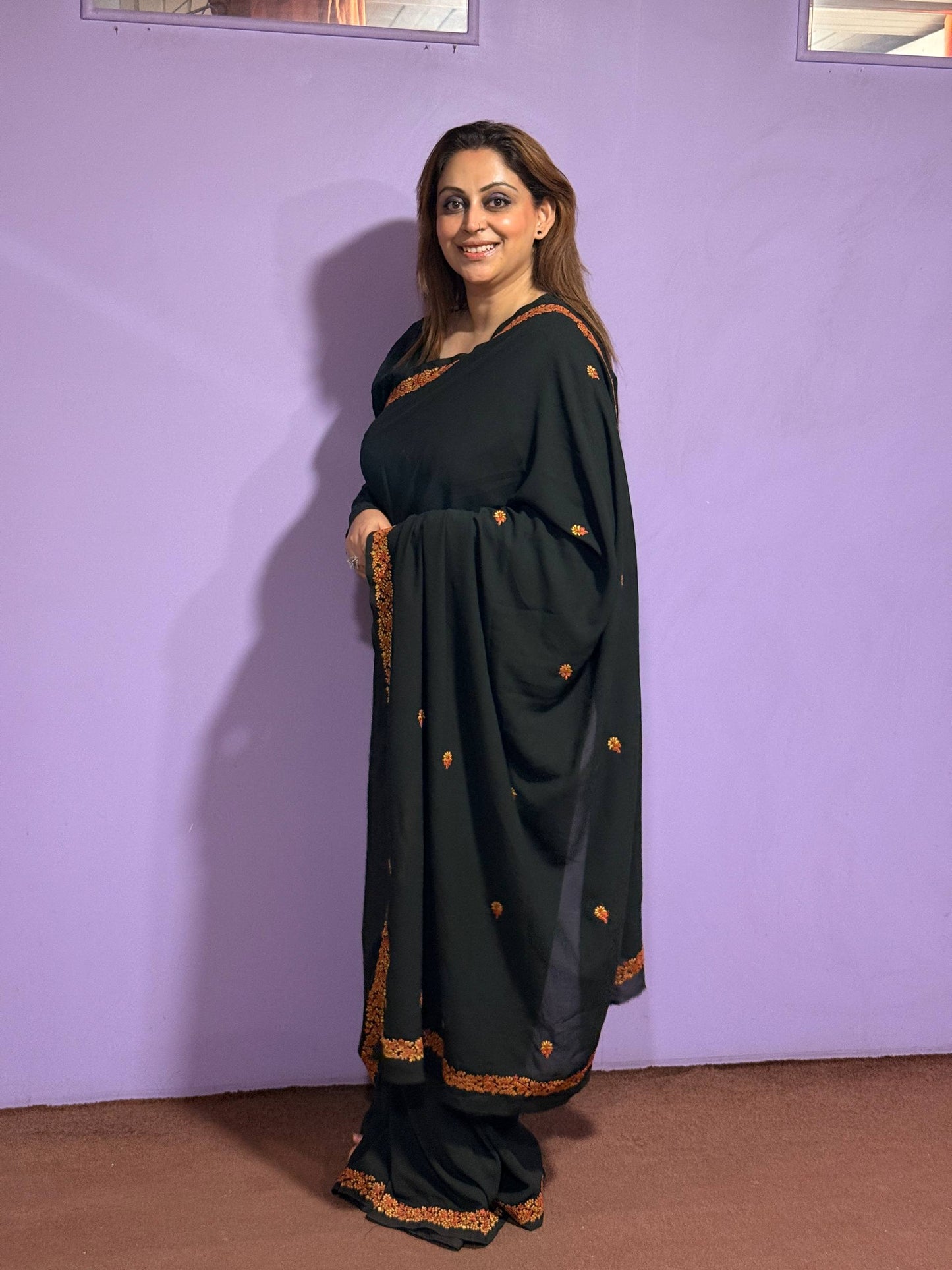 Black Georgette Saree with Hand Aari Work and Motifs