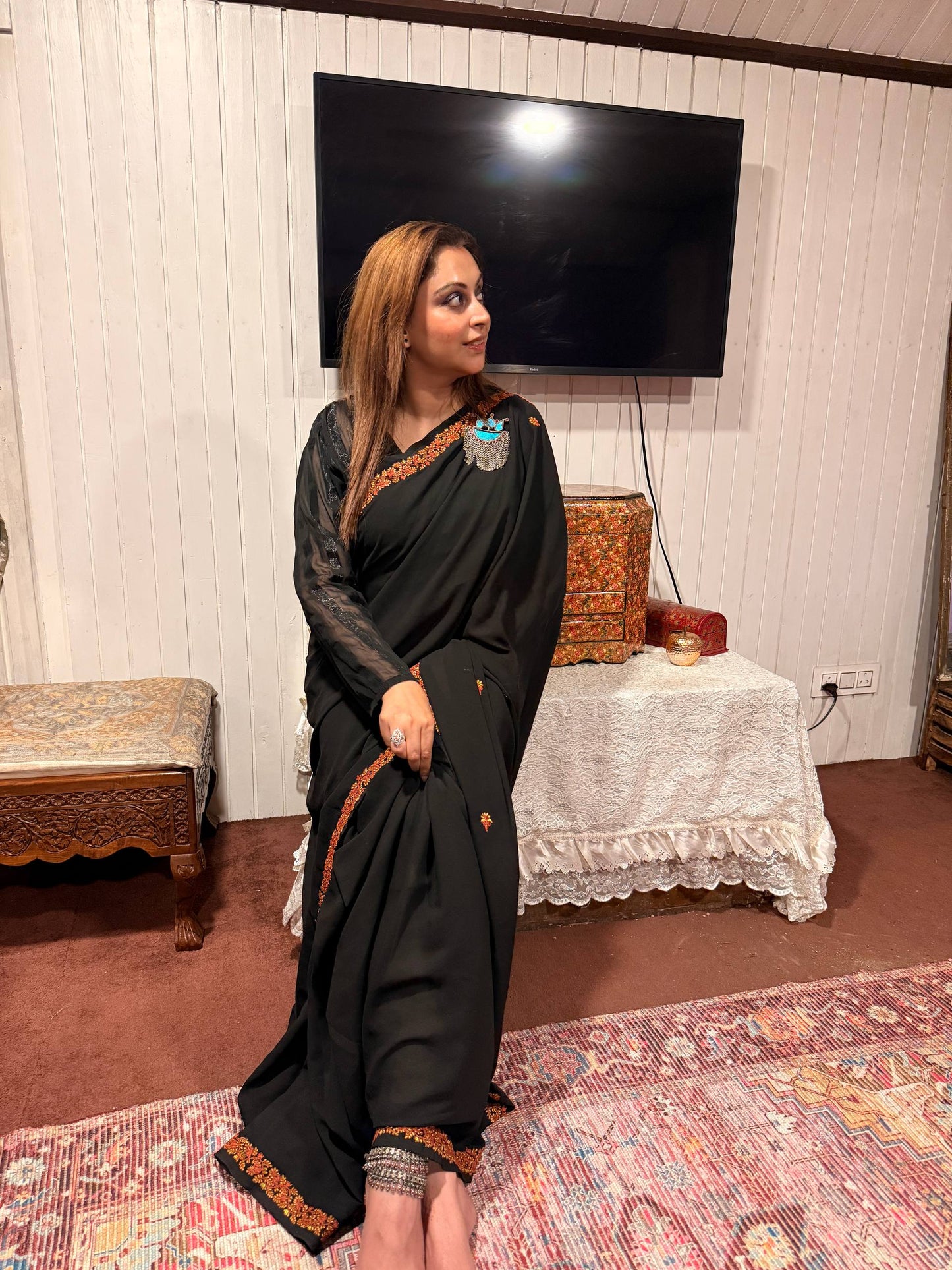 Black Georgette Saree with Hand Aari Work and Motifs